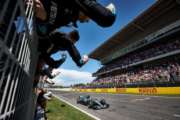 LEWIS TOASTS VICTORY WITH 44 AT SPANISH GP THRILLER