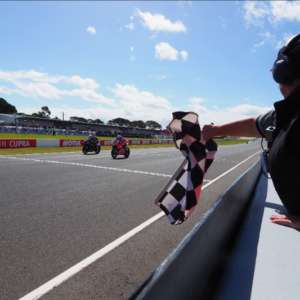 Make Melandri's a double: Ducati rider beats Rea in stunning photo finish